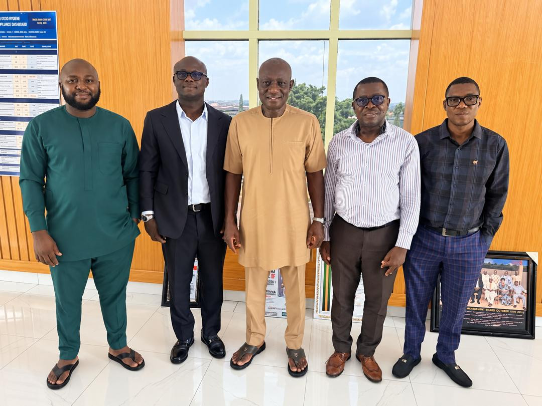 Five men standing together in an office at UNTH Enugu.